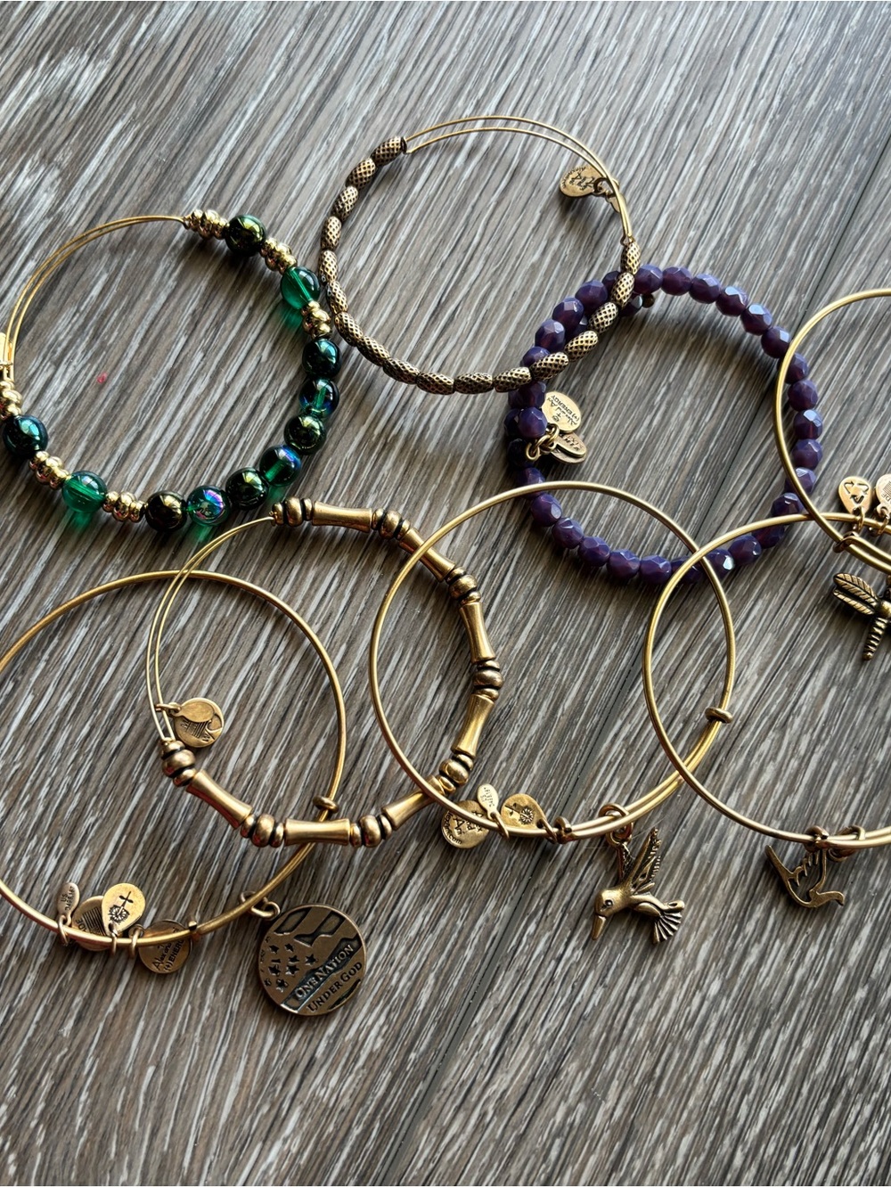 Alex and Ani Gold Tone Stack with Purple and Green Beaded Accents